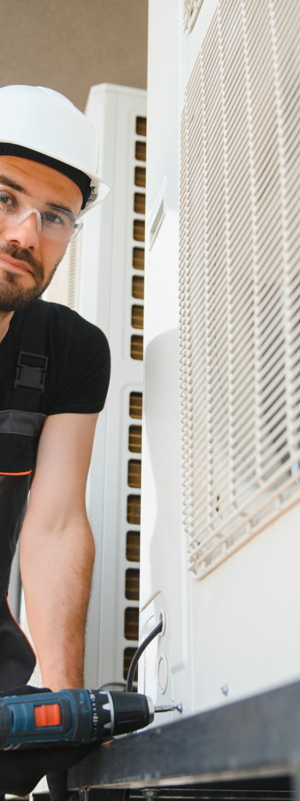Technician man install new air conditioner, Repairman service for repair and maintenance of air conditioners Technician man install new air conditioner, Repairman service for repair and maintenance of air conditioners.